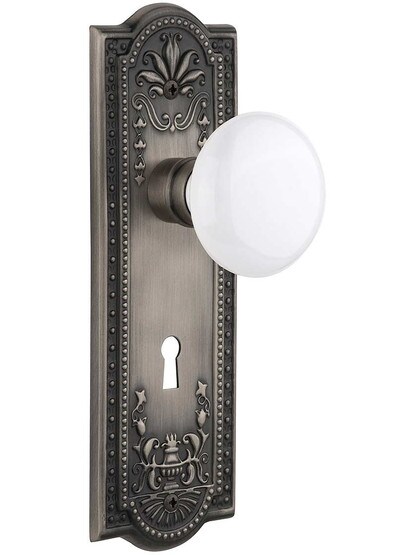 Meadows Door Set with White Porcelain Knobs and Keyhole - 2 3/8 in Antique Pewter.
